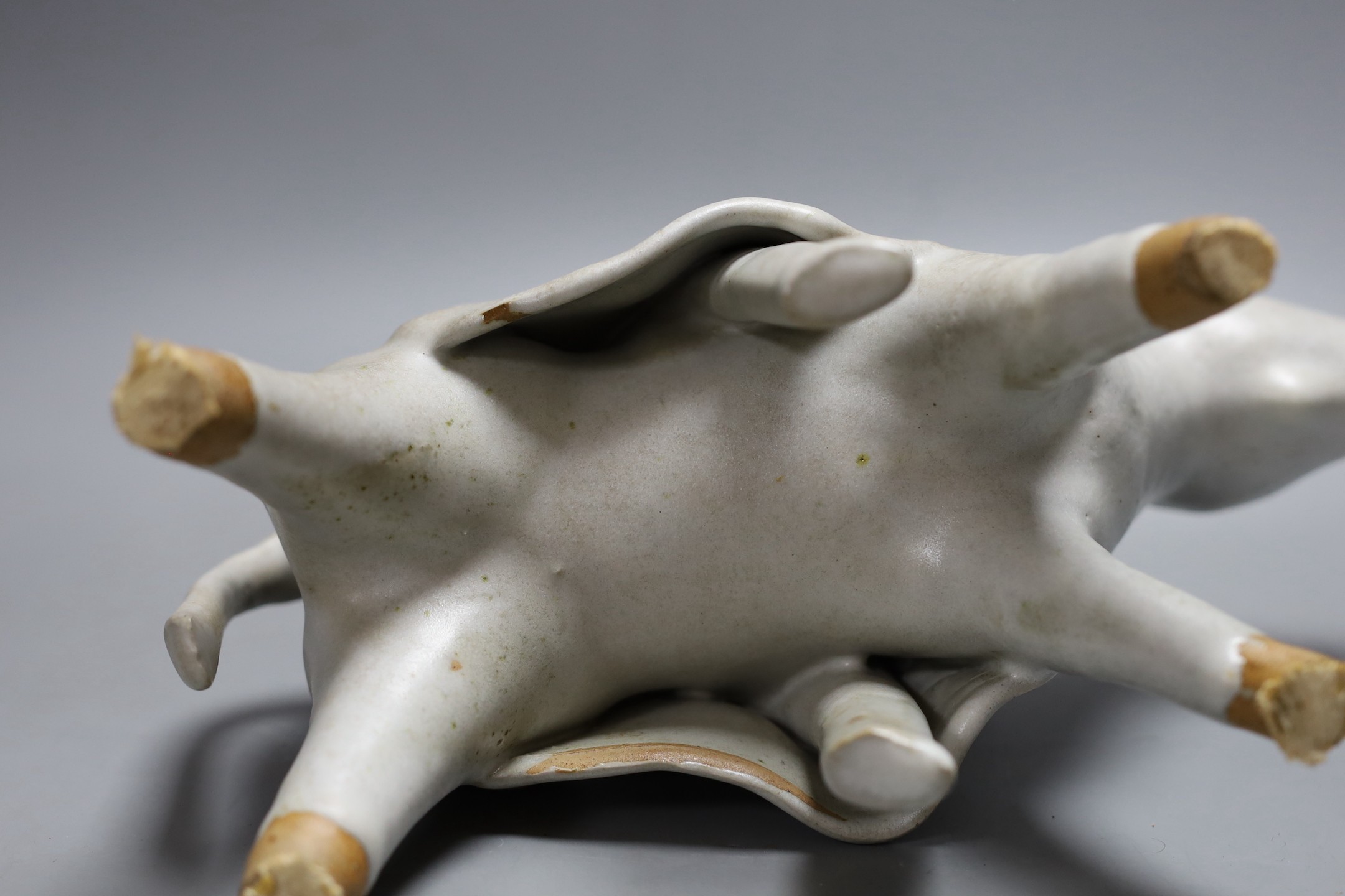 An abstract studio pottery figure of man on a donkey. 43cm high